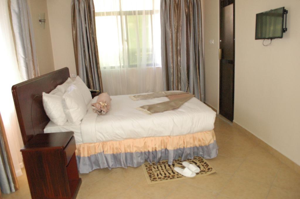 Grace Land Hotel Arusha Habitación foto